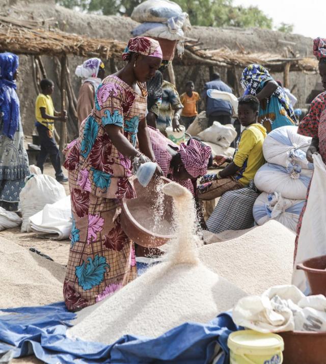 photo of women at a market