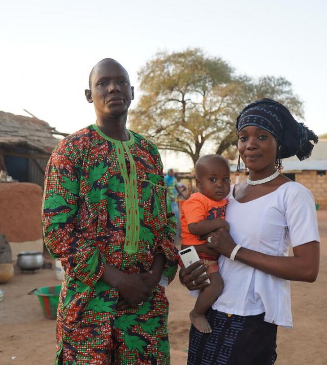 A family standing in a village
